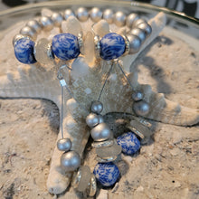 Load image into Gallery viewer, Fused Blue &amp; White beads with silver accents
