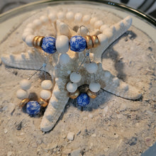 Load image into Gallery viewer, Fused Blue &amp; White beads with gold
