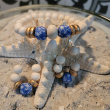 Load image into Gallery viewer, Fused Blue &amp; White beads with gold
